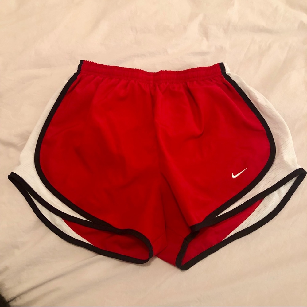 Red Nike shorts